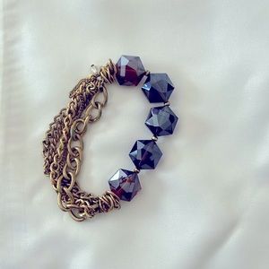 gold and purple bracelet